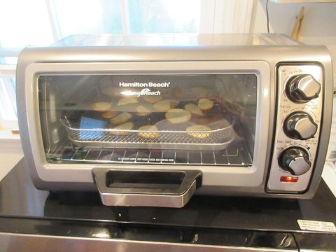 Air fried potato slices in toaster oven.jpg
