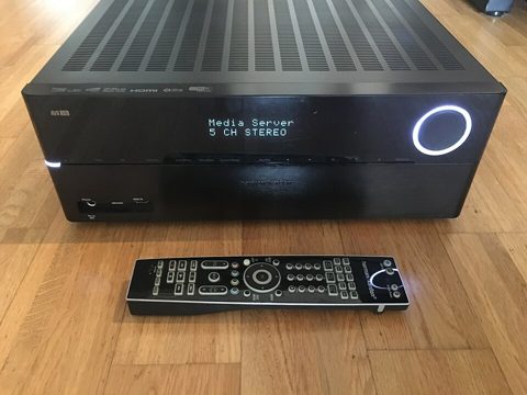 Harman Kardon AVR 370 AV receiver (2013) front top view, switched on, with remote control.jpg