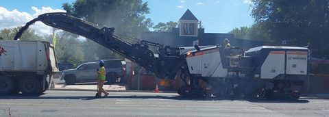 Wirtgen W 210 Fi cold planer milling asphalt road.png