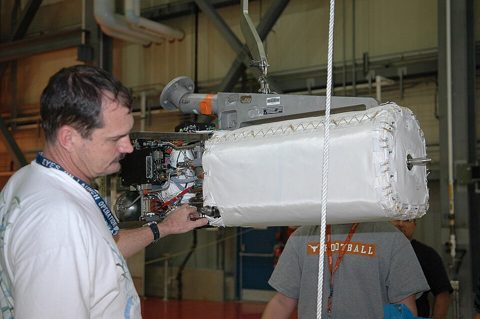KSC-06pd0004 - Technicians working on fuel cell in OPF.jpg