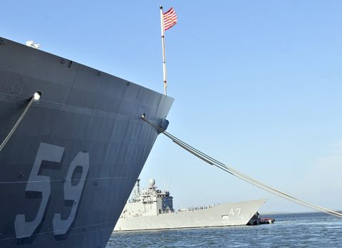 US Navy 110825-N-YF306-051 The guided-missile frigate USS Nicholas (FFG 47) passes the guided-missile frigate USS Kauffmann (FFG 59) as it departs.jpg