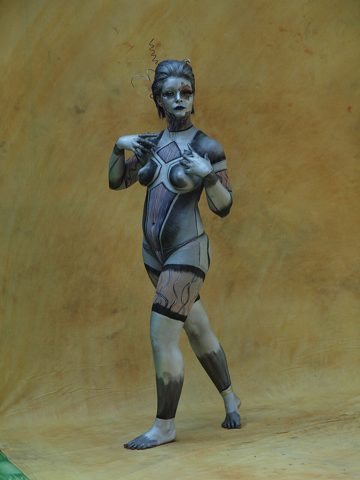 Female robot body painting at WBF 2016.jpg