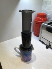 AeroPress Coffee Maker: Hand-pressed plunger device that forces hot water through ground coffee