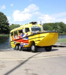Amphibious Duck Boat: Wheeled tour vehicle styled on wartime ducks that drives on roads and floats