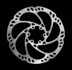 Brake Disc (rotor): Cast-iron or steel disc bolted to the hub that the brake pads clamp to slow the wheel
