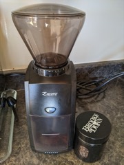 Burr Coffee Grinder: Electric grinder with adjustable burrs for uniform coffee particle size