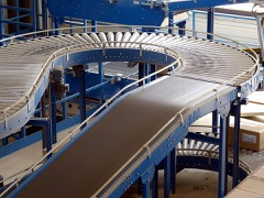 Checkweighing Conveyor: Conveyor that weighs each package in motion and rejects out-of-spec ones