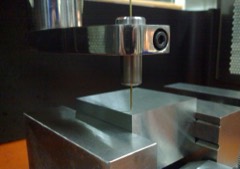 EDM Hole Drilling Machine: Electrical-discharge machine that bores tiny accurate holes in hard metal