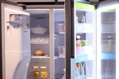 French Door Refrigerator: A large refrigerator with two side-by-side top doors over a pull-out bottom freezer drawer