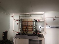 Grid Flow Battery System: Container of redox-flow cells and tanks for long-duration grid storage