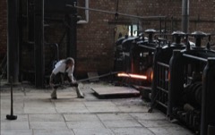 Hot Rolling Mill: Mill stand that rolls heated steel slabs into plate, strip and sections
