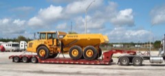 Lowboy Trailer: Low-deck heavy-haul trailer for transporting tall machinery