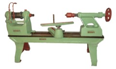 Metal Spinning Lathe: Lathe that forms a flat sheet-metal blank into a round hollow shape by pressing it against a spinning