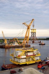 Offshore Wind Jacket Foundation: Steel lattice substructure anchoring a turbine in deeper offshore water. Four tubular legs
