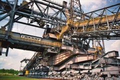 Overburden Conveyor Bridge: Mobile bridge conveyor that transfers stripped overburden across a lignite pit
