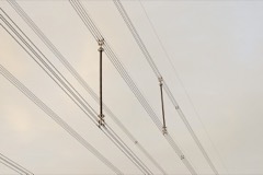 Overhead Line Conductor Bundle: ACSR conductor and spacer assembly strung between transmission towers