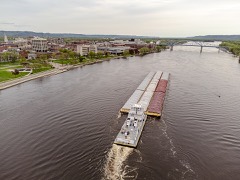 River Pusher Tug: Square-bowed towboat that pushes barge tows along rivers