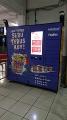 Refrigerated Pickup Locker: Secure cold-storage kiosk with chilled and frozen compartments that dispenses online grocery
