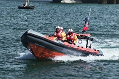 Rigid Inflatable Boat: Fast boat combining a solid hull with inflatable buoyancy tubes