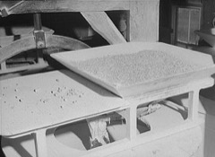 Roll Grinding Machine: Large precision grinder that resurfaces the heavy rolls used in steel and aluminum rolling mills