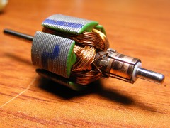 Rotor Assembly: Rotating member of an electric motor: a laminated steel core carrying permanent magnets or conductor bars