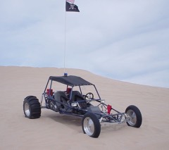 Sand Rail Buggy: Skeletal tube-frame off-roader built for blasting across dunes