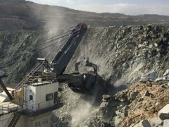 Mining Shovel Dipper: Heavy dipper bucket on an electric rope shovel for loading ore