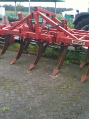 Subsoiler: Deep tillage tool that fractures compacted soil pans below plow depth