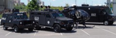 SWAT Tactical Vehicle: Armored police vehicle for transporting tactical teams to incidents