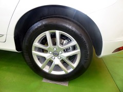 Tire: Pneumatic rubber tyre mounted on a wheel rim that carries the vehicle load, grips the ground, and cushions the ride