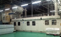Vacuum Forming Machine: Machine that draws heated plastic sheet onto a mold with vacuum
