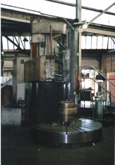 Vertical Boring Mill: Large machine with a rotating horizontal table for turning heavy, big-diameter parts