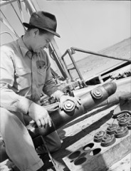Perforating Gun: Charged downhole tool that punches holes through casing into the reservoir. A steel carrier holds shaped