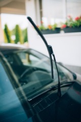 Windshield: Laminated safety-glass panel bonded into the front aperture of the body that protects the occupants and carries